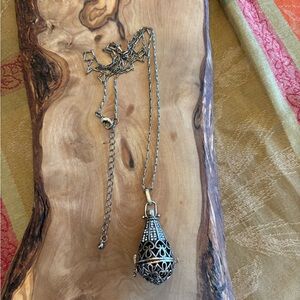 Intricate Silver/Gold Toned Filigree Pendant Necklace adorned with CZ.